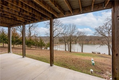This expansive home in Warsaw, MO offers a blend of comfort and - photo 48