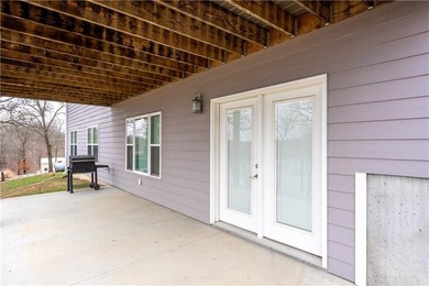 This expansive home in Warsaw, MO offers a blend of comfort and - photo 49
