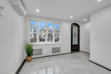 Motivated seller! Located on a quiet residential block in the - photo 3