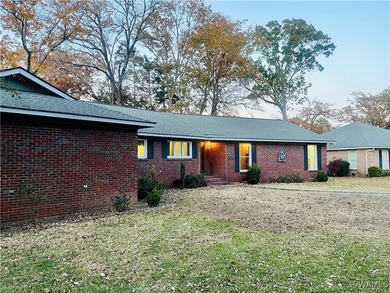 Welcome to this spacious, single-level, all-brick home featuring