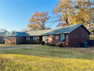 Welcome to this spacious, single-level, all-brick home featuring