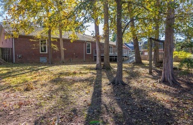 Welcome to this spacious, single-level, all-brick home featuring