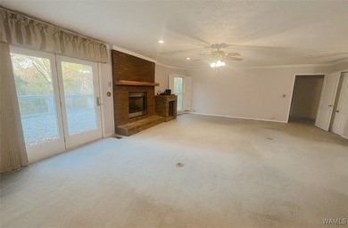 Welcome to this spacious, single-level, all-brick home featuring