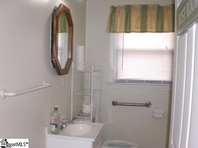 Desirable location just off Wade Hampton Boulevard suitable for