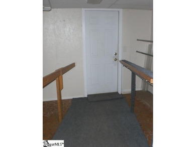 Desirable location just off Wade Hampton Boulevard suitable for