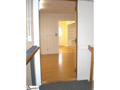 Desirable location just off Wade Hampton Boulevard suitable for