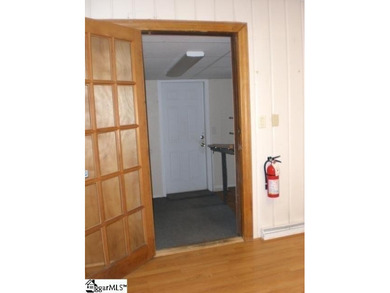 Desirable location just off Wade Hampton Boulevard suitable for