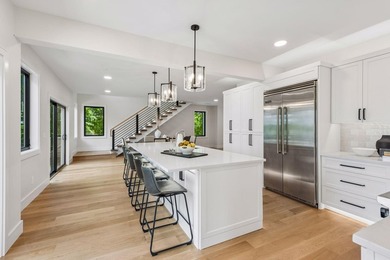 Experience exceptional Lake Minnetonka living with 75 feet of - photo 27