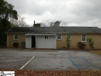 Desirable location just off Wade Hampton Boulevard suitable for