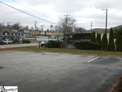 Desirable location just off Wade Hampton Boulevard suitable for