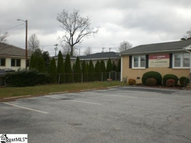 Desirable location just off Wade Hampton Boulevard suitable for