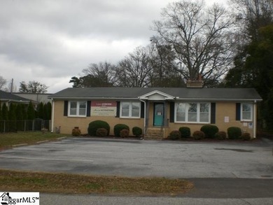 Desirable location just off Wade Hampton Boulevard suitable for