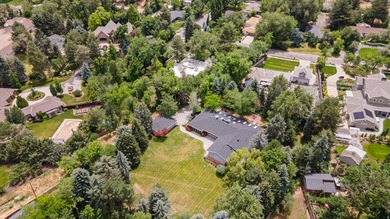 Tucked away behind a private tree-lined drive in one of - photo 2