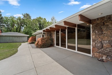 Tucked away behind a private tree-lined drive in one of - photo 4
