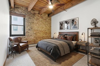 Located on a quiet street in the heart of the North Loop, you - photo 4