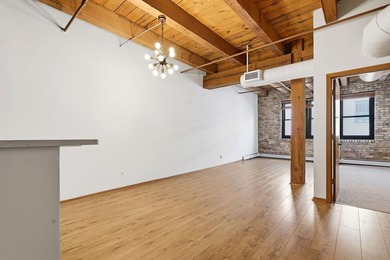 Located on a quiet street in the heart of the North Loop, you - photo 7