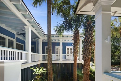 Surrounded by mature live oaks and set on more than half an acre - photo 21