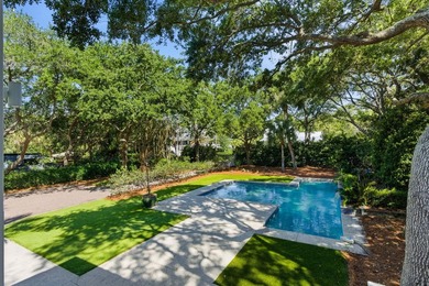 Surrounded by mature live oaks and set on more than half an acre - photo 24