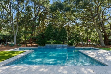 Surrounded by mature live oaks and set on more than half an acre - photo 26