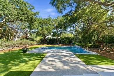 Surrounded by mature live oaks and set on more than half an acre - photo 27