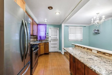 Welcome to 3241 Colden Avenue, a beautifully maintained - photo 6