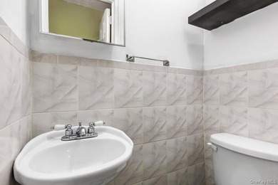 Welcome to 3241 Colden Avenue, a beautifully maintained - photo 9