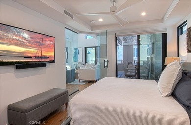 Tucked away on a coveted street south of PCH, this exceptional - photo 16