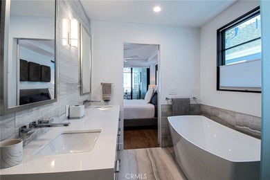 Tucked away on a coveted street south of PCH, this exceptional - photo 17