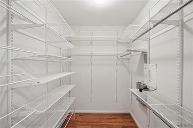 Truly a rare find, this stepless first-floor 2 bed, 2 bath condo