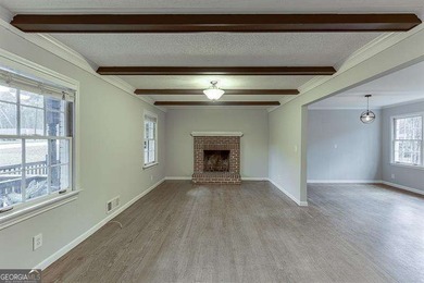 Welcome to Rowland Hills and this 4-bedroom, 3-bathroom Stone