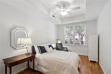 Truly a rare find, this stepless first-floor 2 bed, 2 bath condo