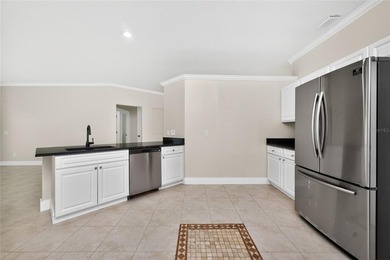 This 2,019-square-foot Cape Coral home features 3 Bedrooms, 2 - photo 22