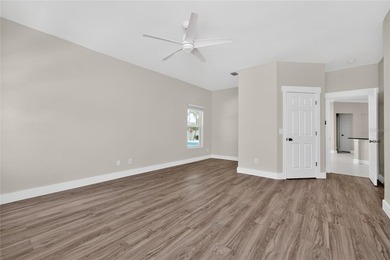 This 2,019-square-foot Cape Coral home features 3 Bedrooms, 2 - photo 29