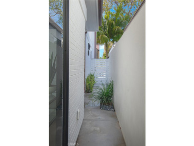 Tucked away on a coveted street south of PCH, this exceptional - photo 30