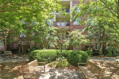 Truly a rare find, this stepless first-floor 2 bed, 2 bath condo