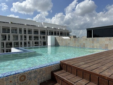 This beautiful garden level condo for sale on Calle 38 in Playa