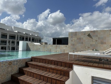 This beautiful garden level condo for sale on Calle 38 in Playa