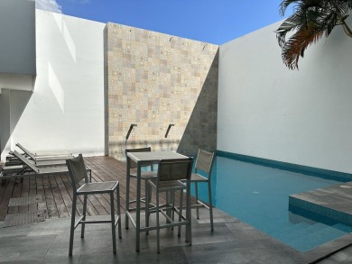 This beautiful garden level condo for sale on Calle 38 in Playa