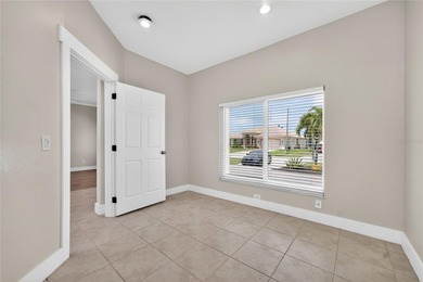 This 2,019-square-foot Cape Coral home features 3 Bedrooms, 2 - photo 44