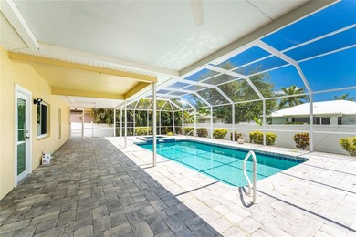 This 2,019-square-foot Cape Coral home features 3 Bedrooms, 2 - photo 50