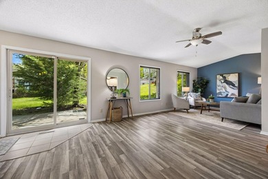 Welcome to this inviting end-unit townhome in the desirable - photo 2