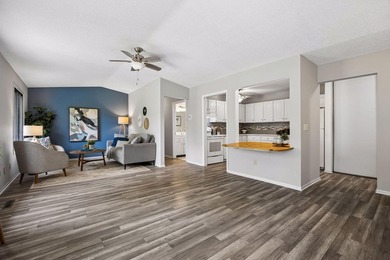 Welcome to this inviting end-unit townhome in the desirable - photo 3