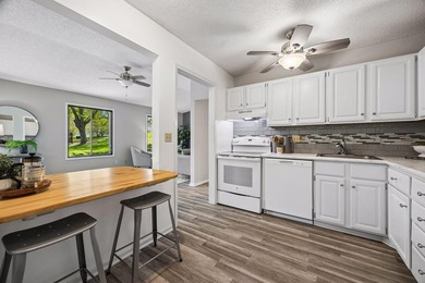 Welcome to this inviting end-unit townhome in the desirable - photo 7