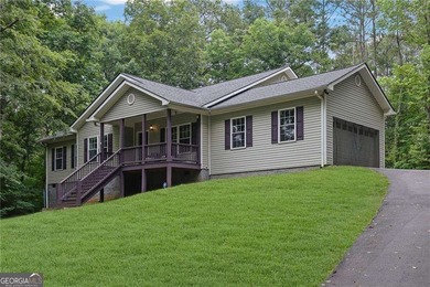 Nestled on a private lot in the quiet Lake Allatoona community - photo 3