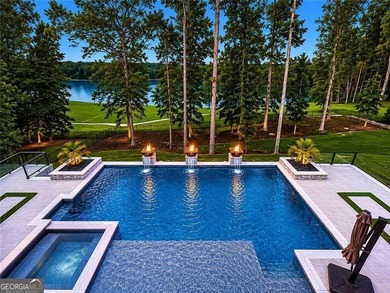 Beautiful, prime golf course and lake views set the stage for - photo 1