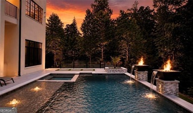 Beautiful, prime golf course and lake views set the stage for - photo 4