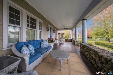 The historic c. 1904 Scranton Homestead, described as a Colonial - photo 8