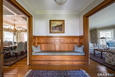 The historic c. 1904 Scranton Homestead, described as a Colonial - photo 10