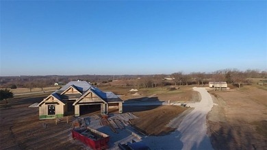 As of 5/26 home is in sheetrock stage, Exterior Paint and Roof - photo 6