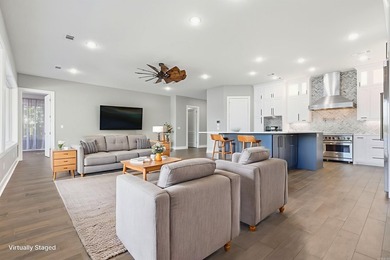 Luxury lakefront living awaits in this custom-built 2022 home on - photo 12
